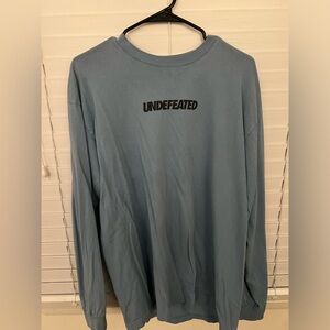Undefeated teal shirt size L